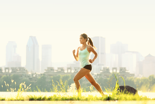 girl running with city background